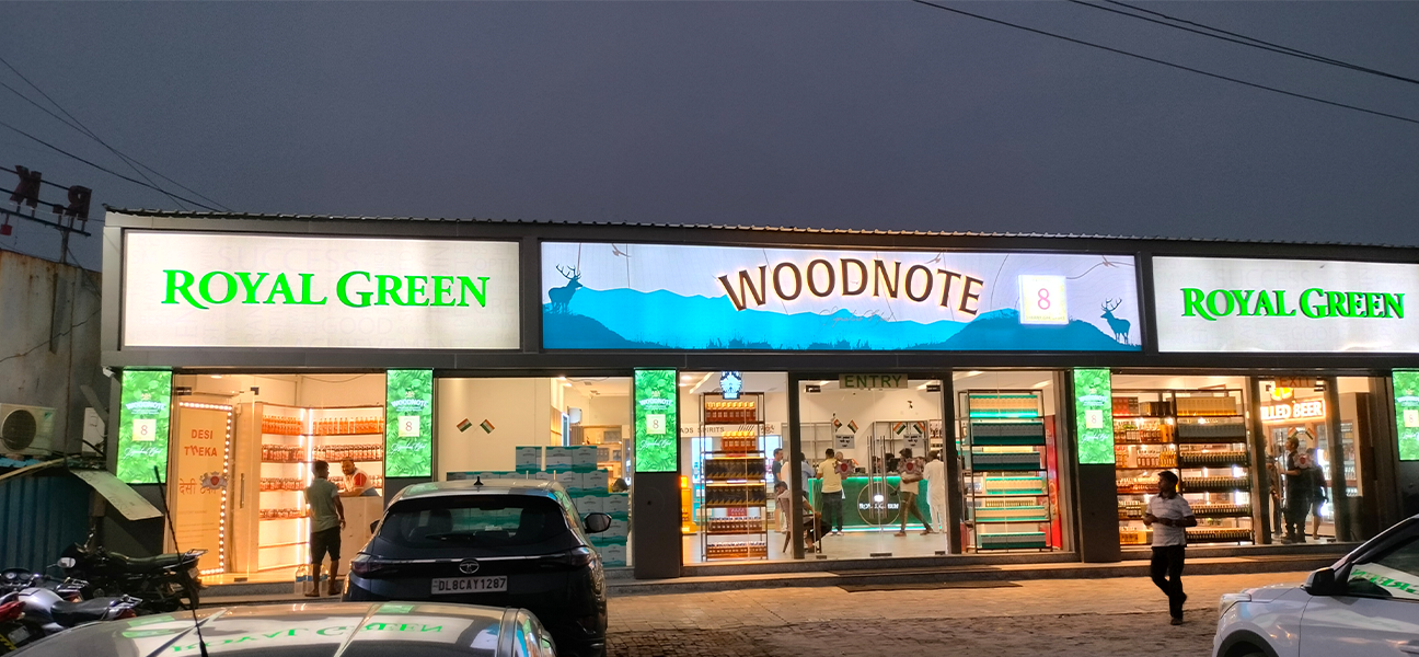 Woodnote Brand Shop Bahadurgarh retail liquor store interior by Next BC